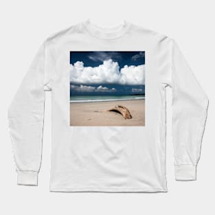 Beach driftwood and dark blue sky Long Sleeve T-Shirt